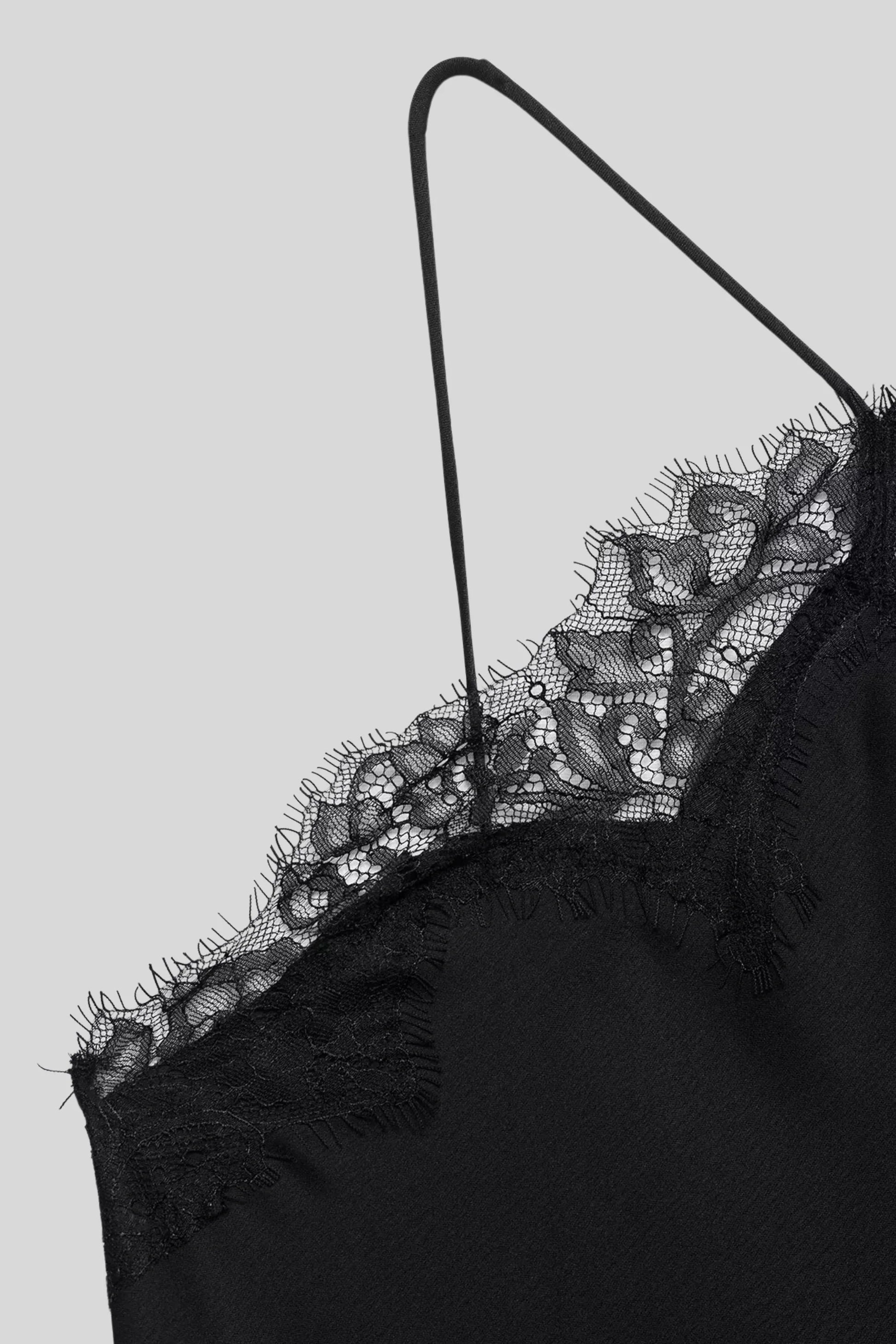 Black Satin Dress That Follows Every Curve Without Clinging Black