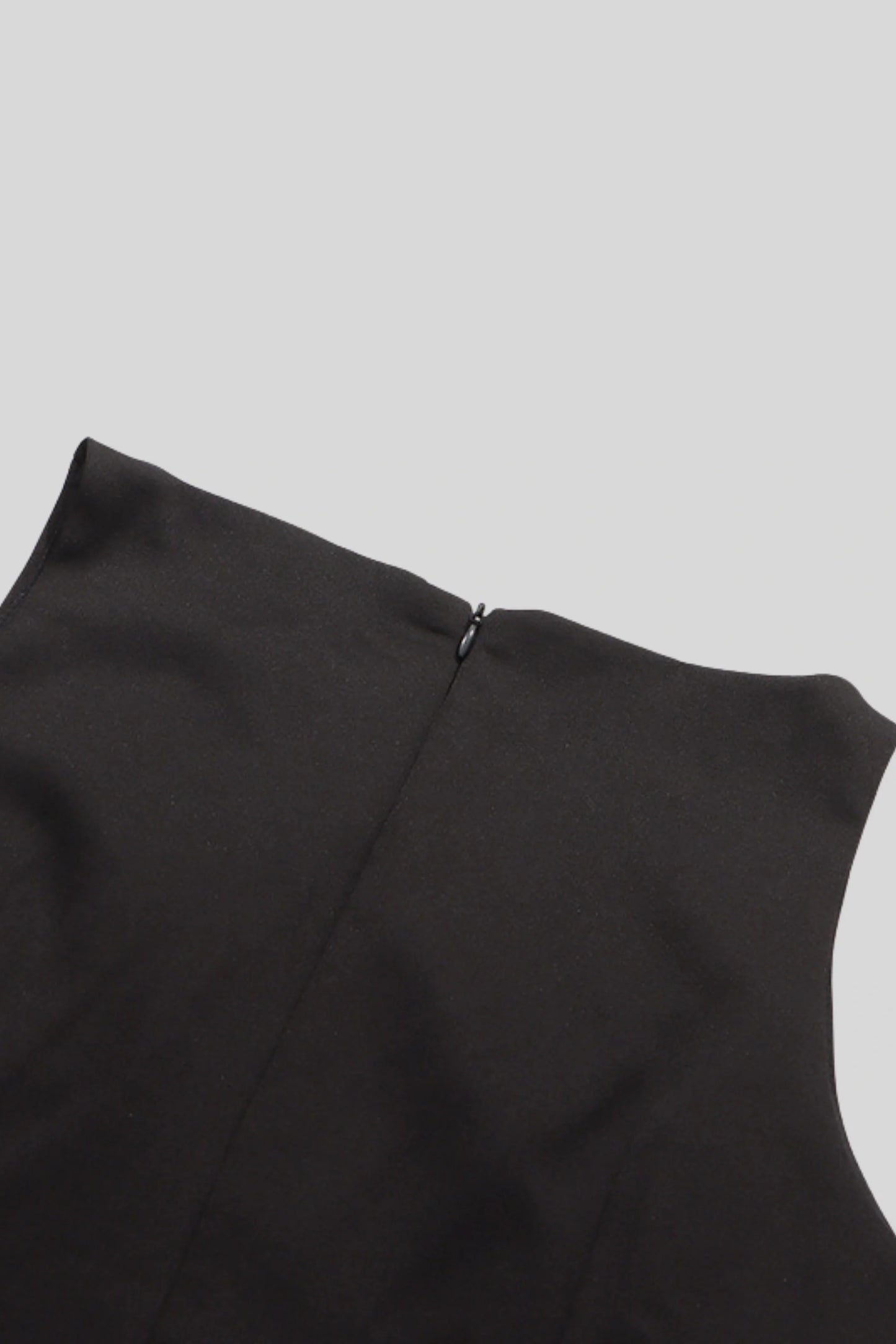 Peplum Sleeveless Top with Decorative Buttons Black