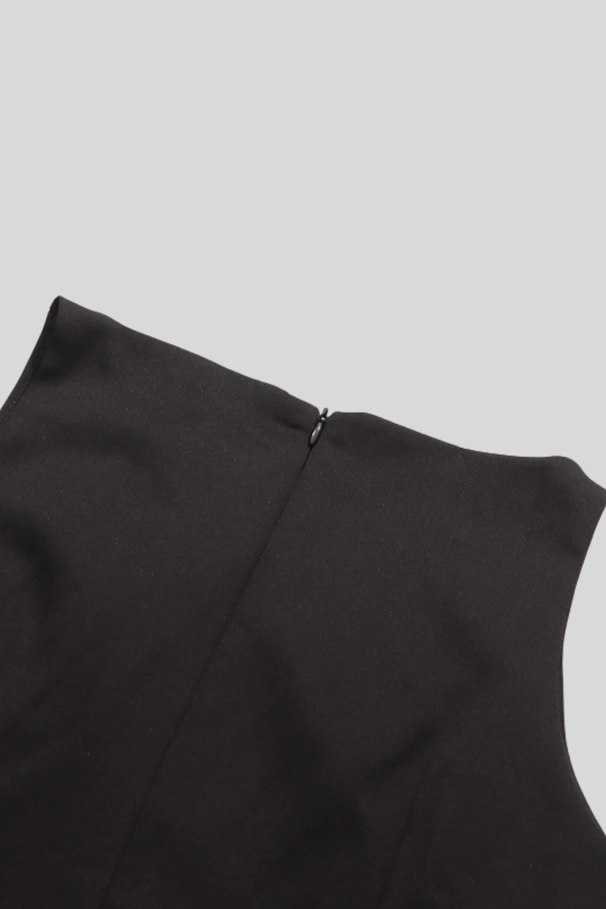 Peplum Sleeveless Top with Decorative Buttons Black