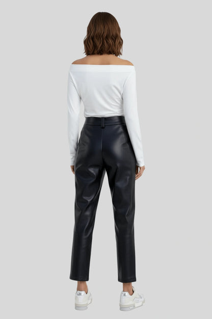 A white knit top with a fitted cut and asymmetrical lines