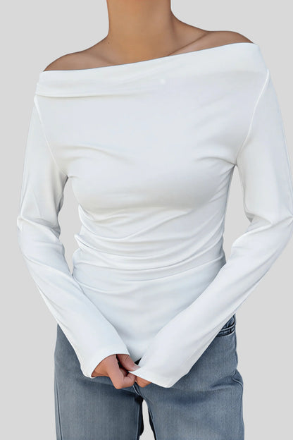 A white knit top with a fitted cut and asymmetrical lines