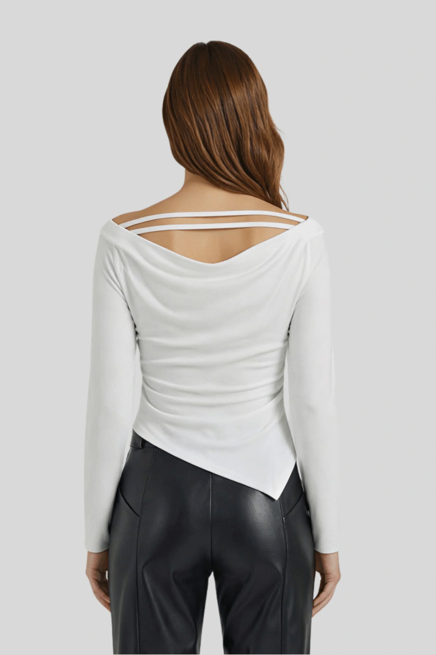 A white knit top with a fitted cut and asymmetrical lines