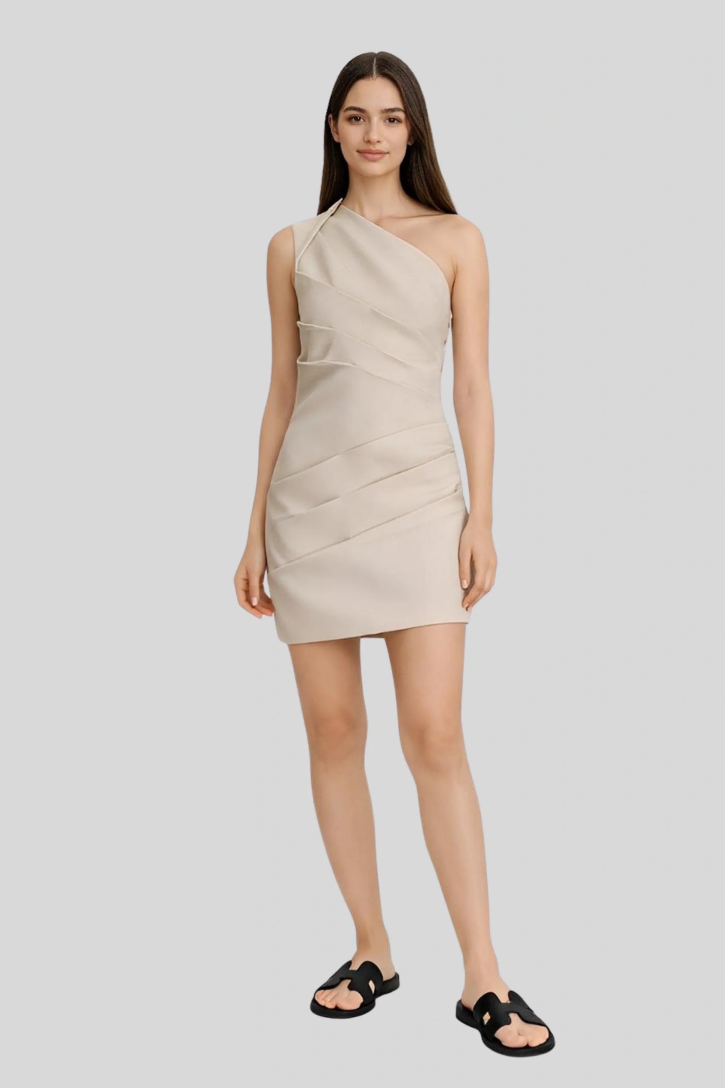 The Asymmetrical Mini Dress That Brings Clean Structure to the Silhouette Beige