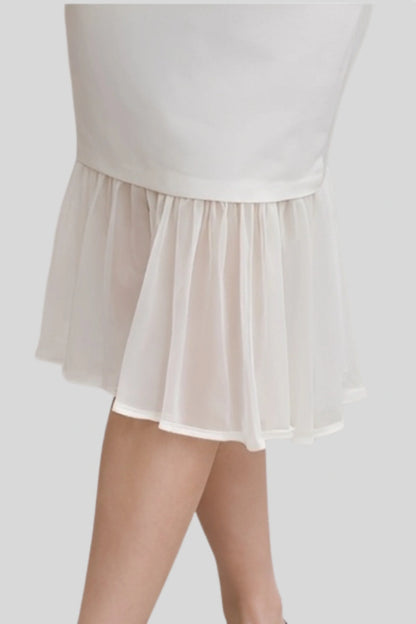 The White Midi Dress That Balances Structure and Lightness White