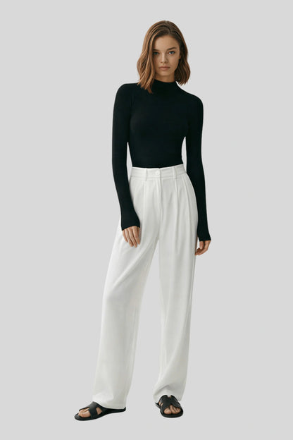 High-waisted wide-leg tailored trousers detail view