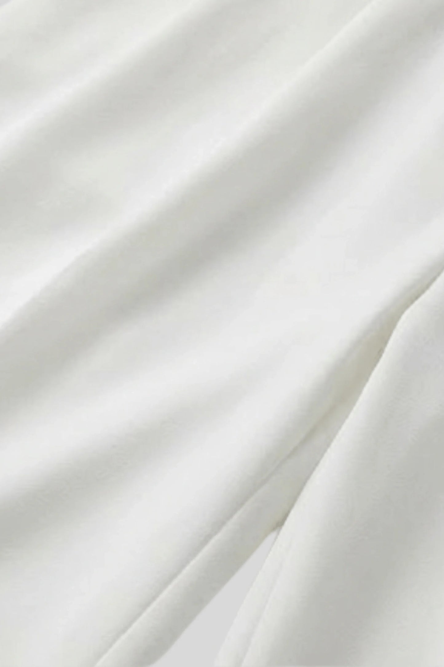 High-waisted wide-leg tailored trousers silhouette view